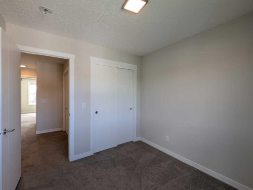 290 Fireside Drive, Cochrane, AB - Indoor Photo Showing Other Room