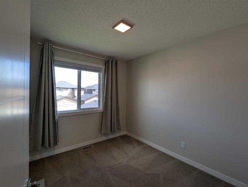 290 Fireside Drive, Cochrane, AB - Indoor Photo Showing Other Room