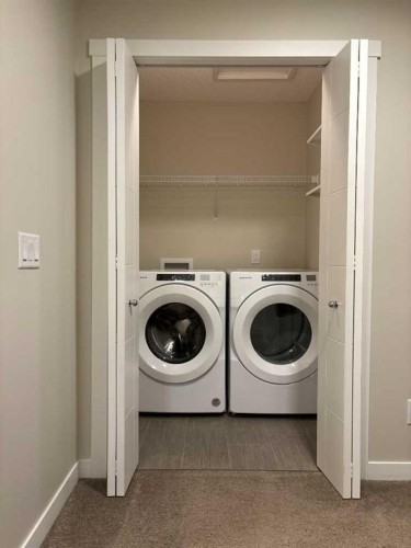 290 Fireside Drive, Cochrane, AB - Indoor Photo Showing Laundry Room
