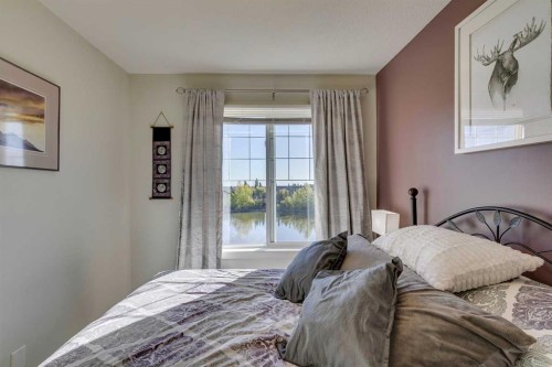 44 Everridge Common Sw, Calgary, AB - Indoor Photo Showing Bedroom