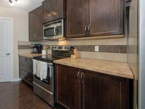 14 Walden Road Se, Calgary, AB - Indoor Photo Showing Kitchen