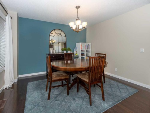 14 Walden Road Se, Calgary, AB - Indoor Photo Showing Dining Room