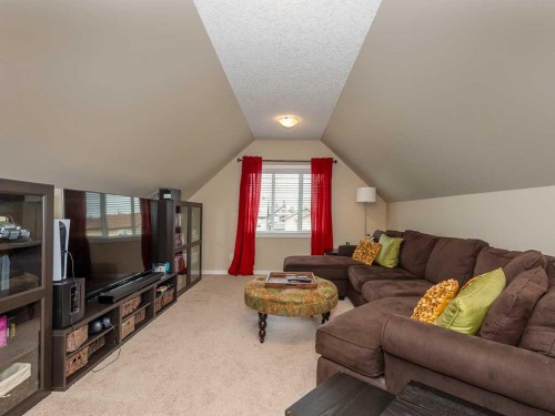 14 Walden Road Se, Calgary, AB - Indoor Photo Showing Living Room
