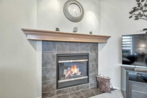 408 Rainbow Falls Way, Chestermere, AB - Indoor With Fireplace