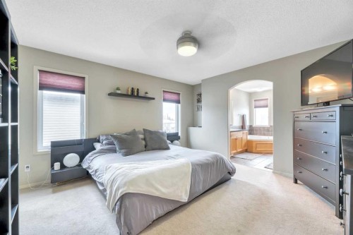 408 Rainbow Falls Way, Chestermere, AB - Indoor Photo Showing Bedroom