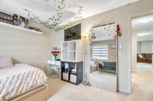 408 Rainbow Falls Way, Chestermere, AB - Indoor Photo Showing Bedroom