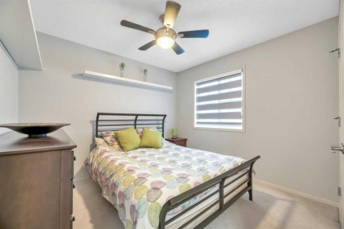 408 Rainbow Falls Way, Chestermere, AB - Indoor Photo Showing Bedroom