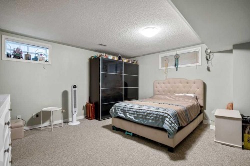 1926/1928 32 Street Sw, Calgary, AB - Indoor Photo Showing Bedroom