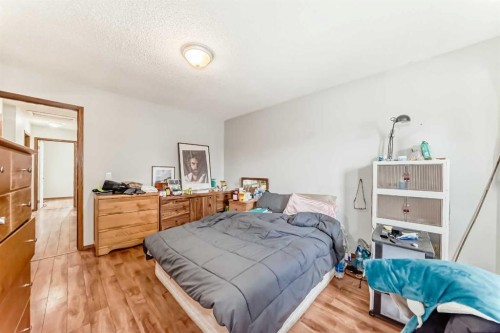 179 Hawkwood Boulevard Nw, Calgary, AB - Indoor Photo Showing Bedroom
