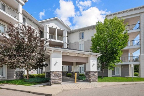 1203-333 Taravista Drive Ne, Calgary, AB - Outdoor With Balcony With Facade