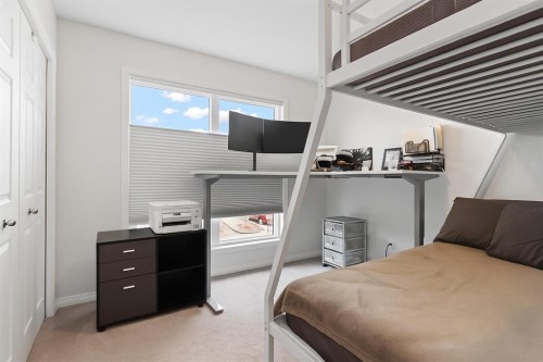 169 Buckskin Way, Cochrane, AB - Indoor Photo Showing Bedroom