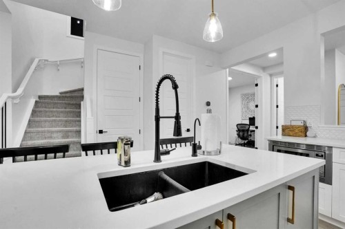88 Magnolia Crescent Se, Calgary, AB - Indoor Photo Showing Kitchen With Double Sink