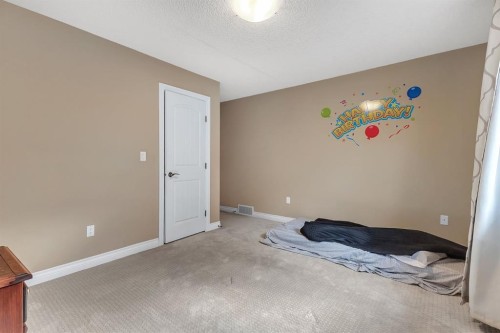 40 Baywater Court Sw, Airdrie, AB - Indoor Photo Showing Bedroom