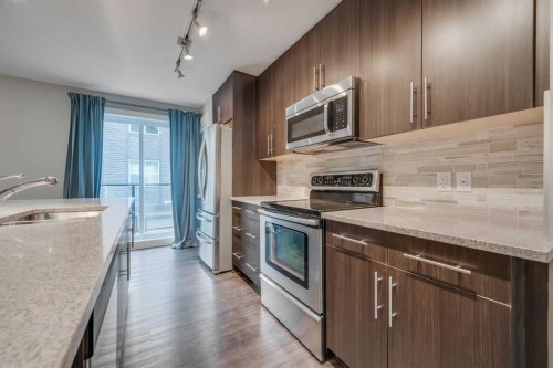 534 Mckenzie Towne Drive Se, Calgary, AB - Indoor Photo Showing Kitchen With Stainless Steel Kitchen