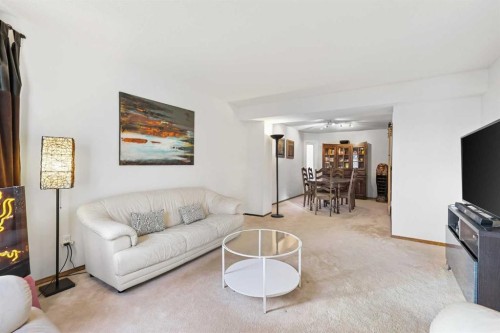188 Christie Park Hill Sw, Calgary, AB - Indoor Photo Showing Living Room