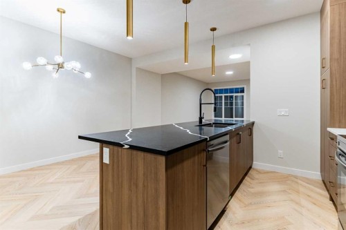 172 Cobblestone Gate Sw, Airdrie, AB - Indoor Photo Showing Kitchen