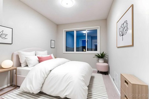 172 Cobblestone Gate Sw, Airdrie, AB - Indoor Photo Showing Bedroom