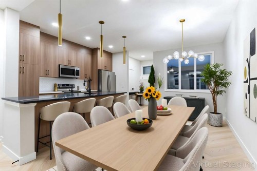 172 Cobblestone Gate Sw, Airdrie, AB - Indoor Photo Showing Dining Room