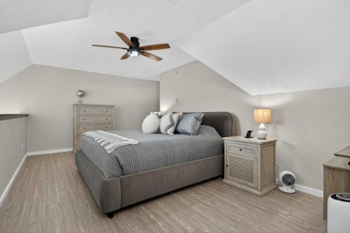 305-141 Mountain Street, Cochrane, AB - Indoor Photo Showing Bedroom