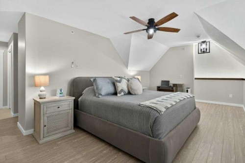 305-141 Mountain Street, Cochrane, AB - Indoor Photo Showing Bedroom