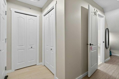 305-141 Mountain Street, Cochrane, AB - Indoor Photo Showing Other Room