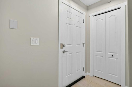 305-141 Mountain Street, Cochrane, AB - Indoor Photo Showing Other Room