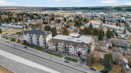 305-141 Mountain Street, Cochrane, AB - Outdoor With View