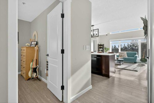305-141 Mountain Street, Cochrane, AB - Indoor Photo Showing Other Room