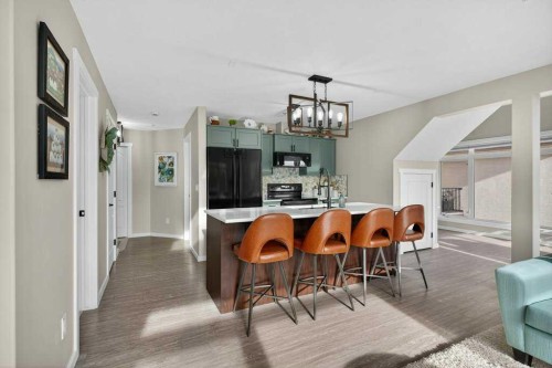 305-141 Mountain Street, Cochrane, AB - Indoor Photo Showing Dining Room