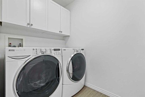 1-5616 14 Avenue Sw, Calgary, AB - Indoor Photo Showing Laundry Room