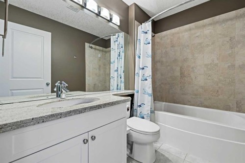 1-5616 14 Avenue Sw, Calgary, AB - Indoor Photo Showing Bathroom