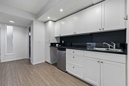 1-5616 14 Avenue Sw, Calgary, AB - Indoor Photo Showing Kitchen With Double Sink