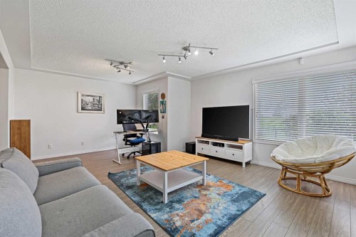 1-5616 14 Avenue Sw, Calgary, AB - Indoor Photo Showing Living Room