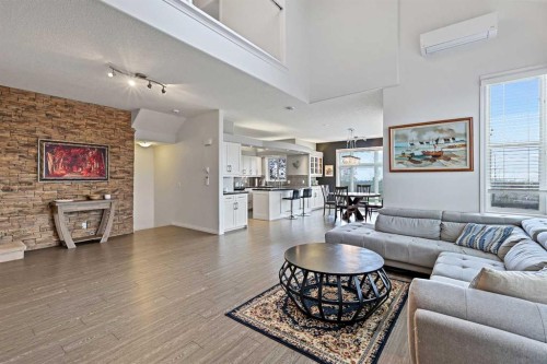 1-5616 14 Avenue Sw, Calgary, AB - Indoor Photo Showing Living Room With Fireplace