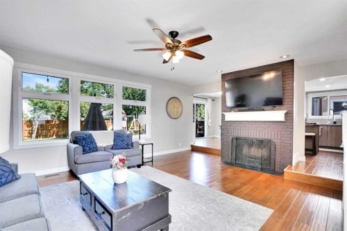 103 Castlebury Way Ne, Calgary, AB - Indoor Photo Showing Living Room With Fireplace