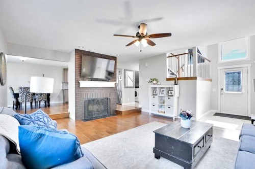 103 Castlebury Way Ne, Calgary, AB - Indoor Photo Showing Living Room With Fireplace