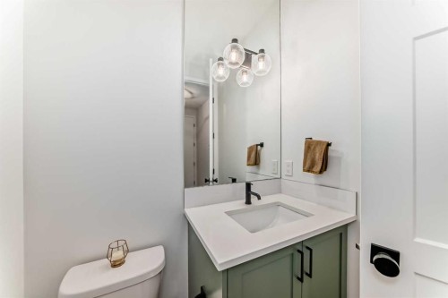 12 West Grove Link Sw, Calgary, AB - Indoor Photo Showing Bathroom