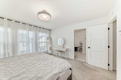 12 West Grove Link Sw, Calgary, AB - Indoor Photo Showing Bedroom