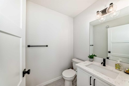 12 West Grove Link Sw, Calgary, AB - Indoor Photo Showing Bathroom