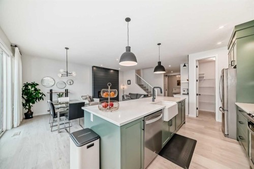 12 West Grove Link Sw, Calgary, AB - Indoor Photo Showing Kitchen With Upgraded Kitchen