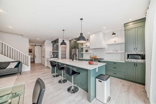 12 West Grove Link Sw, Calgary, AB - Indoor Photo Showing Kitchen With Upgraded Kitchen