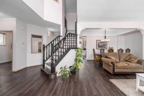 648 Scimitar Bay Nw, Calgary, AB - Indoor Photo Showing Living Room