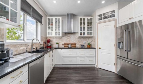 648 Scimitar Bay Nw, Calgary, AB - Indoor Photo Showing Kitchen With Upgraded Kitchen