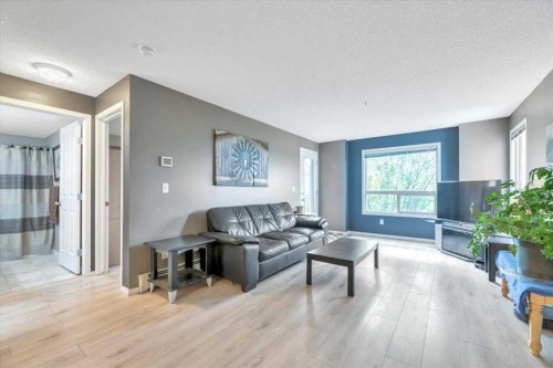 2308-60 Panatella Street Nw, Calgary, AB - Indoor Photo Showing Living Room