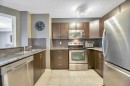 2308-60 Panatella Street Nw, Calgary, AB  - Indoor Photo Showing Kitchen With Stainless Steel Kitchen With Double Sink 