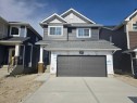 512 Baywater Manor Sw, Airdrie, AB  - Outdoor With Facade 
