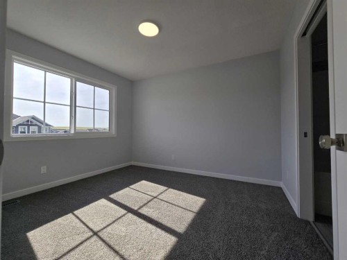 512 Baywater Manor Sw, Airdrie, AB - Indoor Photo Showing Other Room