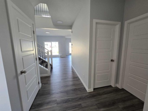 512 Baywater Manor Sw, Airdrie, AB - Indoor Photo Showing Other Room