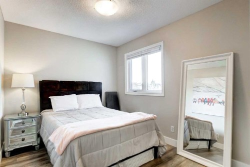 114 Chapalina Park Crescent Se, Calgary, AB - Indoor Photo Showing Bedroom