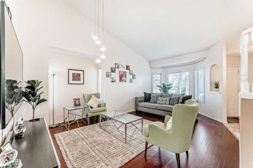 283 Macewan Drive Nw, Calgary, AB - Indoor Photo Showing Living Room